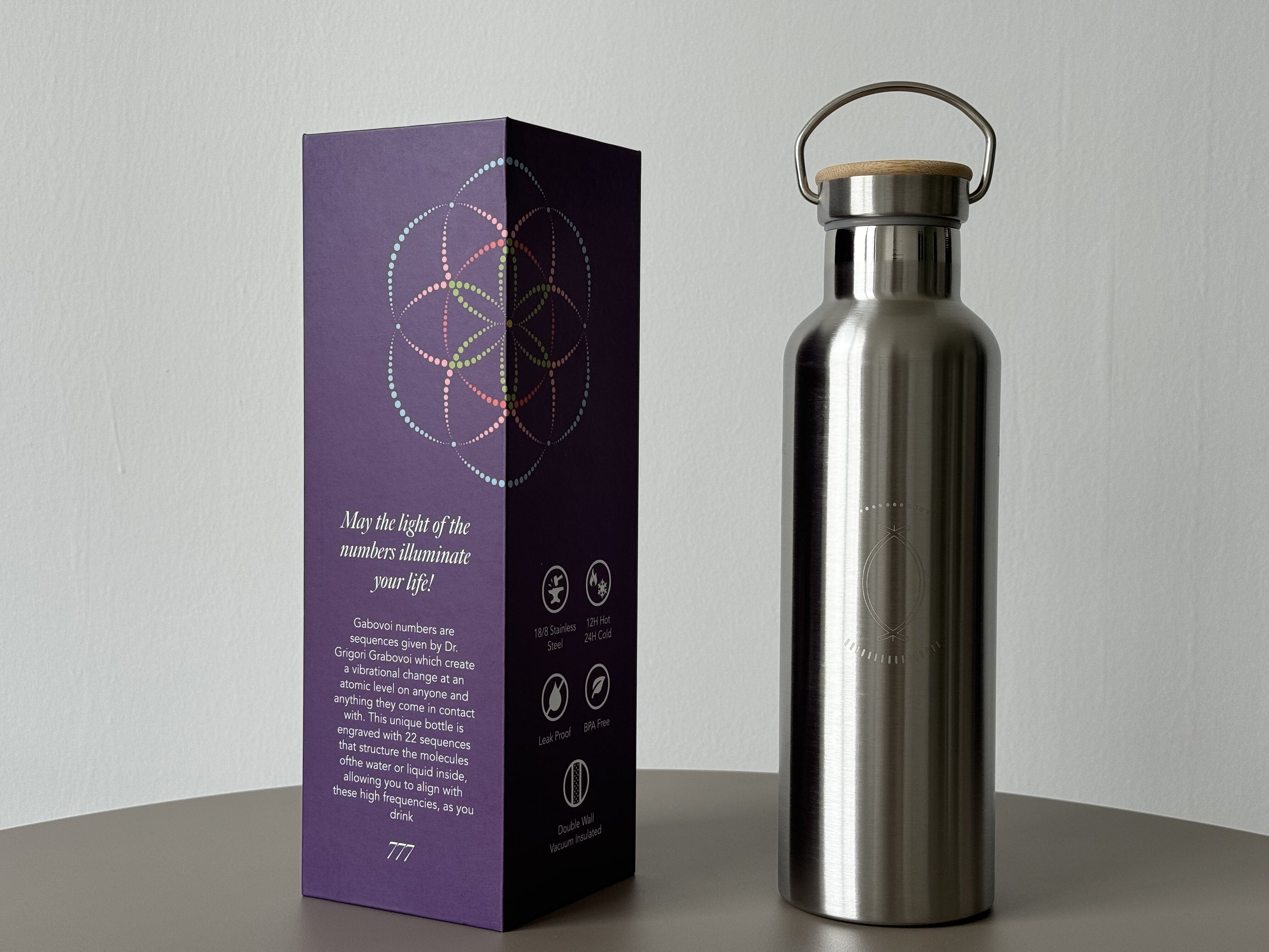 750ml double-walled stainless steel bottle with Grabovoi codes to transform water and align the body with high frequencies.
