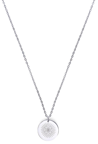 Silver necklace with a round pendant on a white background