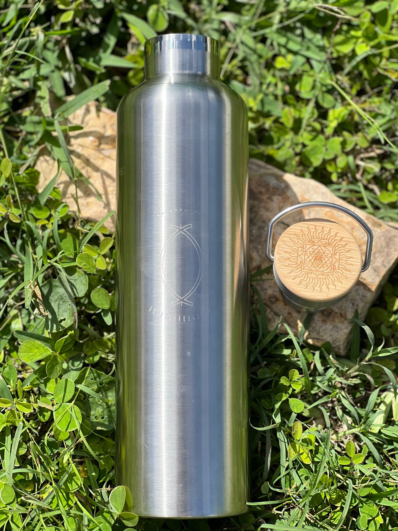 1L silver stainless steel Grabovoi bottle with engraved energy codes to transform water and support vibrational healing.
