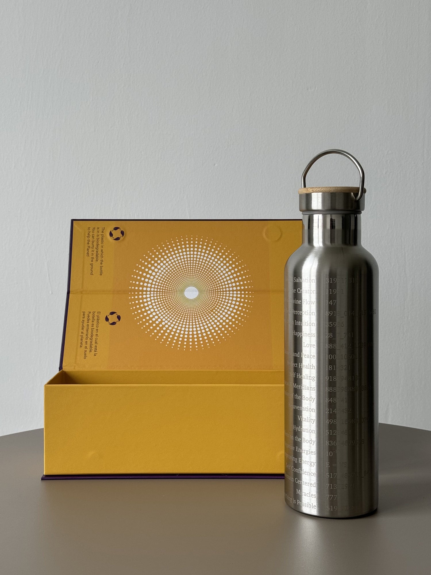 750ml double-walled stainless steel bottle with Grabovoi codes to transform water and align the body with high frequencies.