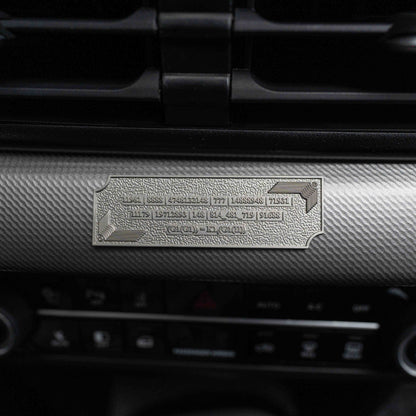 Metallic Grabovoi number charm for vehicles, designed to enhance protection, remove obstacles, and harmonize travel energy